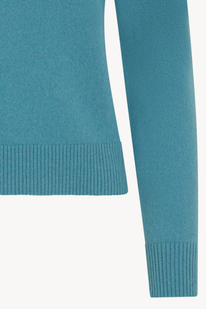Dolcevita con Spacchetto in Puro Cashmere Turchese